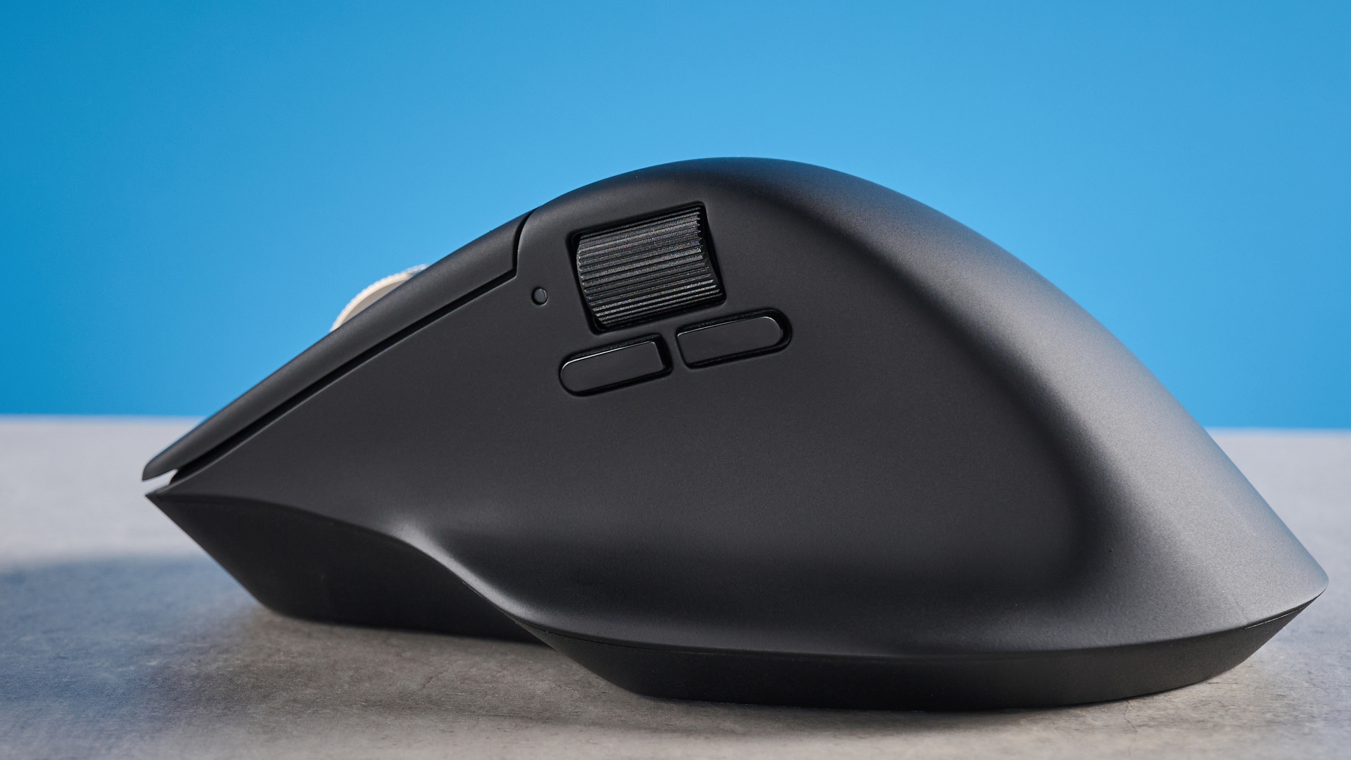 A black Keychron M6 8K ergonomic mouse