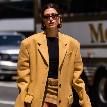 hailey bieber wearing gold hoop earrings included in the missoma feel good weekend sale
