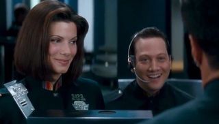 Sandra Bullock and Rob Schneider in Demolition Man