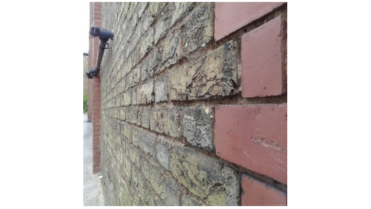 Look along a brick wall