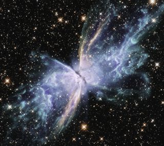 The Butterfly Nebula, also known as NGC 6302, is depicted here in a brilliant image taken by the NASA/ESA Hubble Space Telescope. This nebula lies about 3,800 light-years away from planet Earth in the constellation Scorpius. The striking butterfly shape of the nebula stretches out an incredible distance, over two light-years.