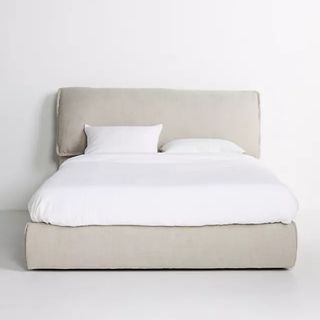 A beige colored bed
