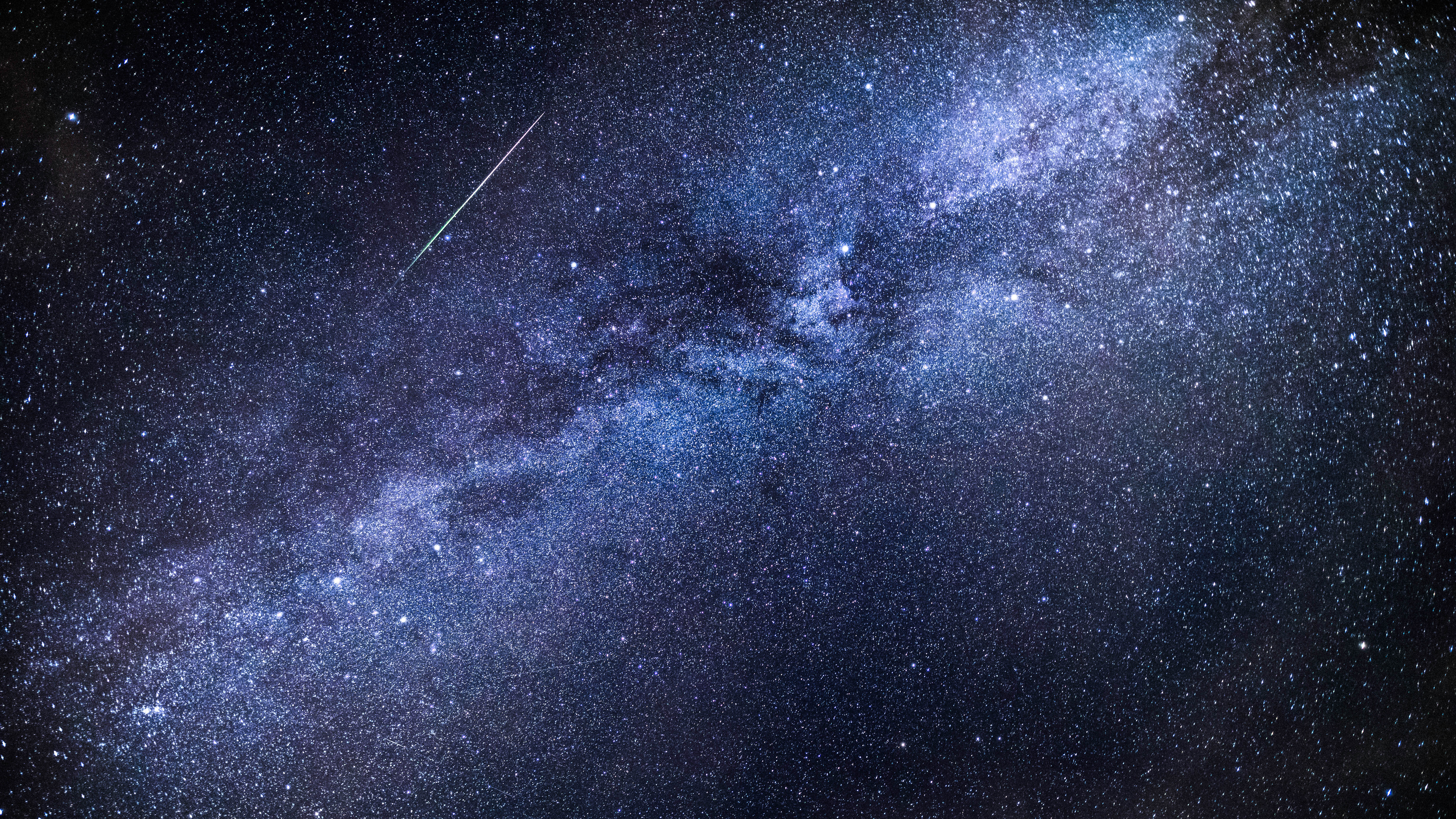 Milky Way and meteor of Perseid meteor shower.