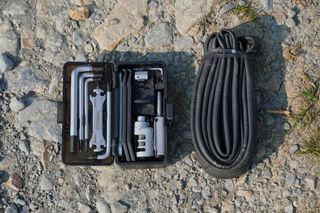 Topeak's Survival Gear Box opened and a inner tube on the Trans Cambrian Way trail