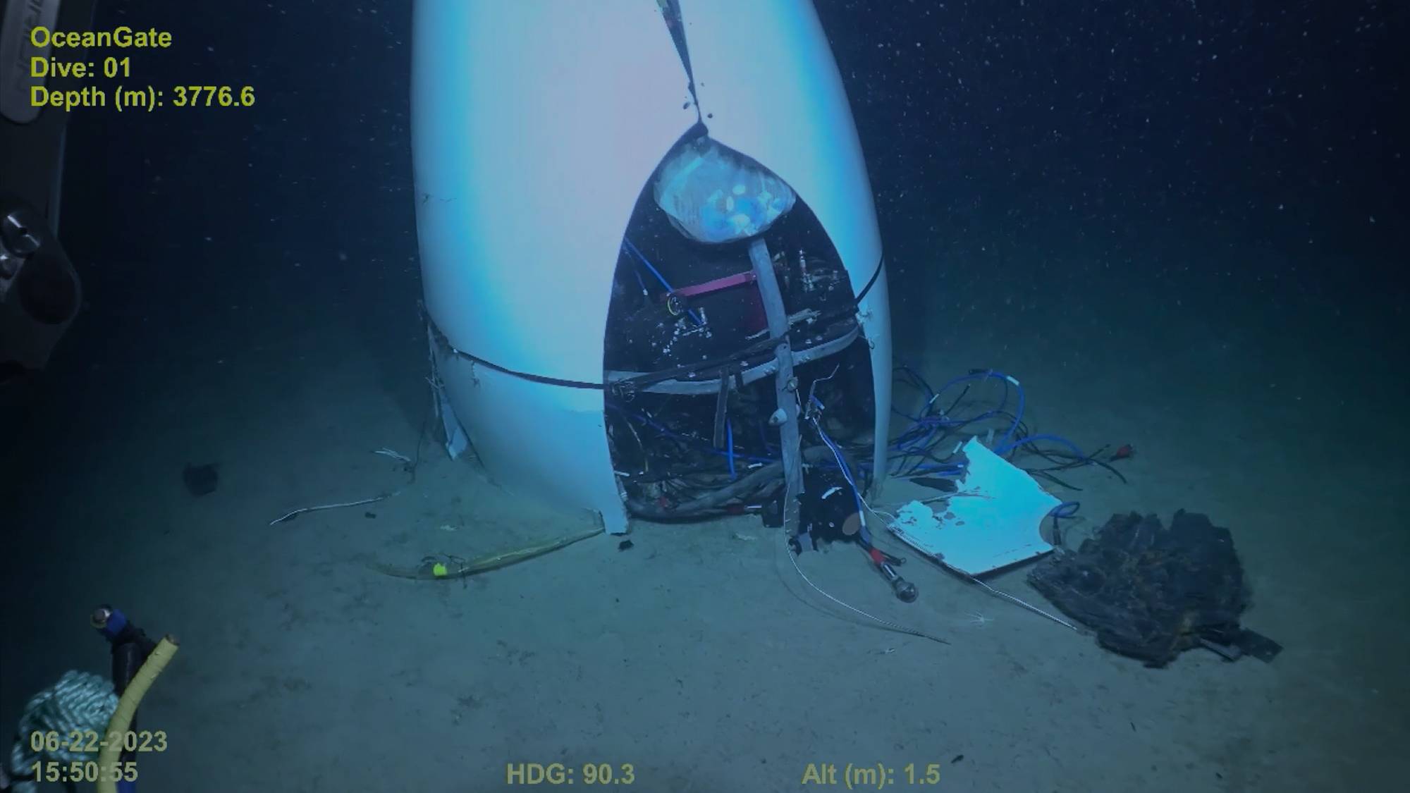 2023 color footage of the US Coast Guard finding debris from Titan on the ocean floor, shown in "Titan: The OceanGate Disaster" on Netflix