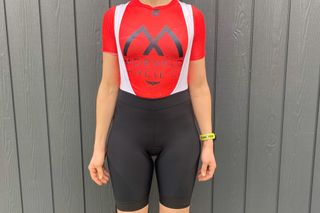 Female cyclist wearing the Rapha Women's Core Bib Shorts