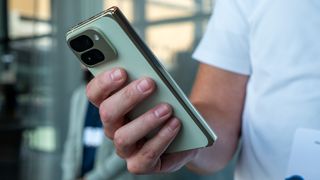 Holding a Jade Google Pixel 10 Pro Fold