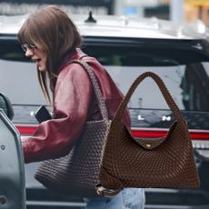 Daisy Edgar Jones gets in a car with her Dune London Bag