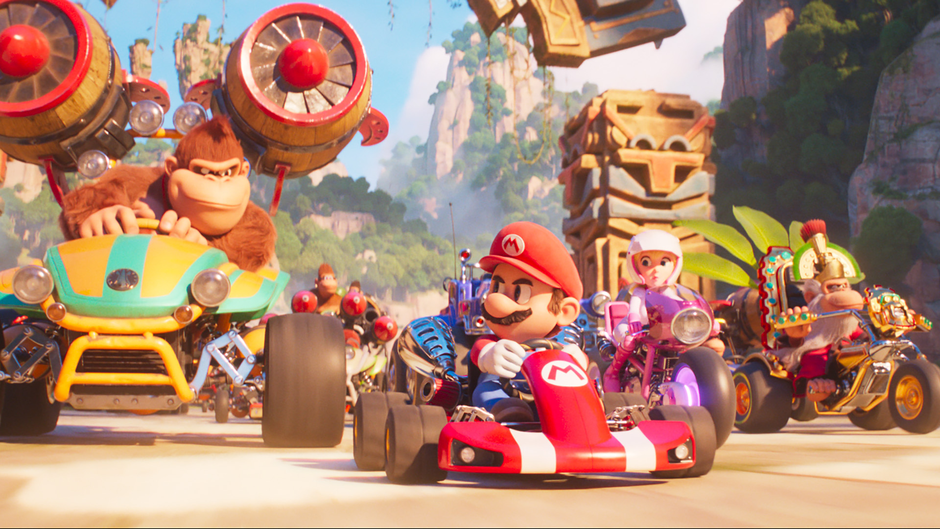 Mario, Peach, Donkey Kong, Toad and Kranky Kong drive their karts in the Super Mario Bros. movie.