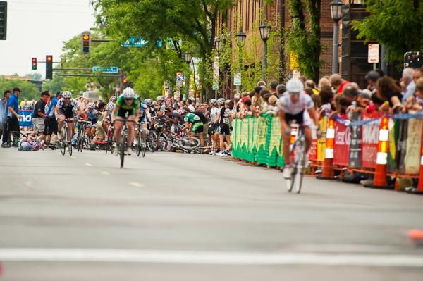 Riders attempt to regain the field after the large pileup.