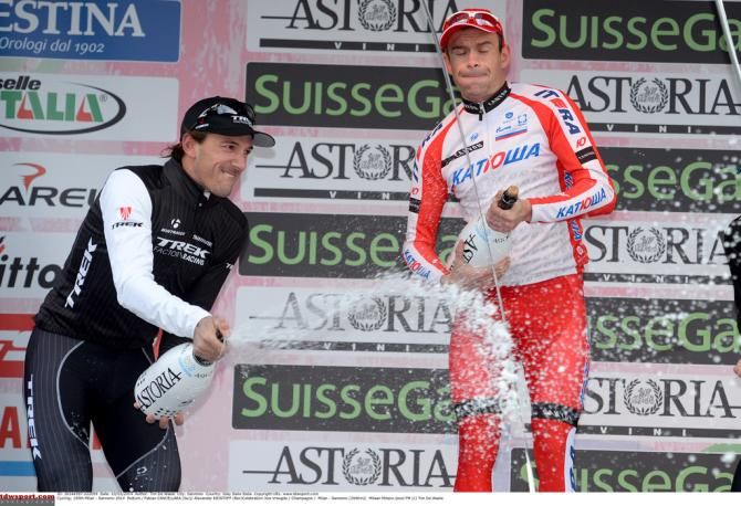 Fabain Cancellara ensures the photographers are soaked