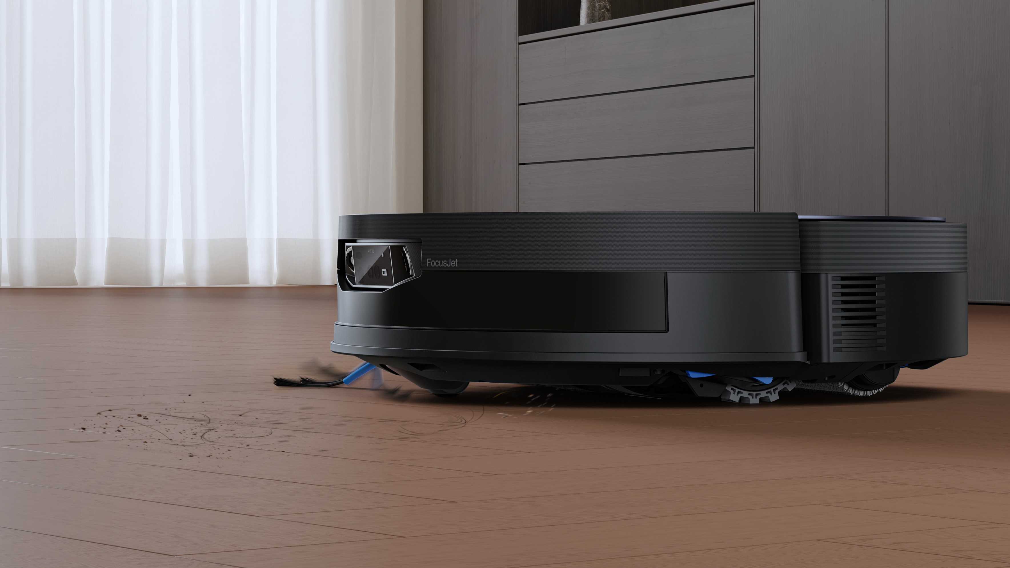 Ecovacs Deebot X12 OmniCyclone robot vacuum sweeping up dirt