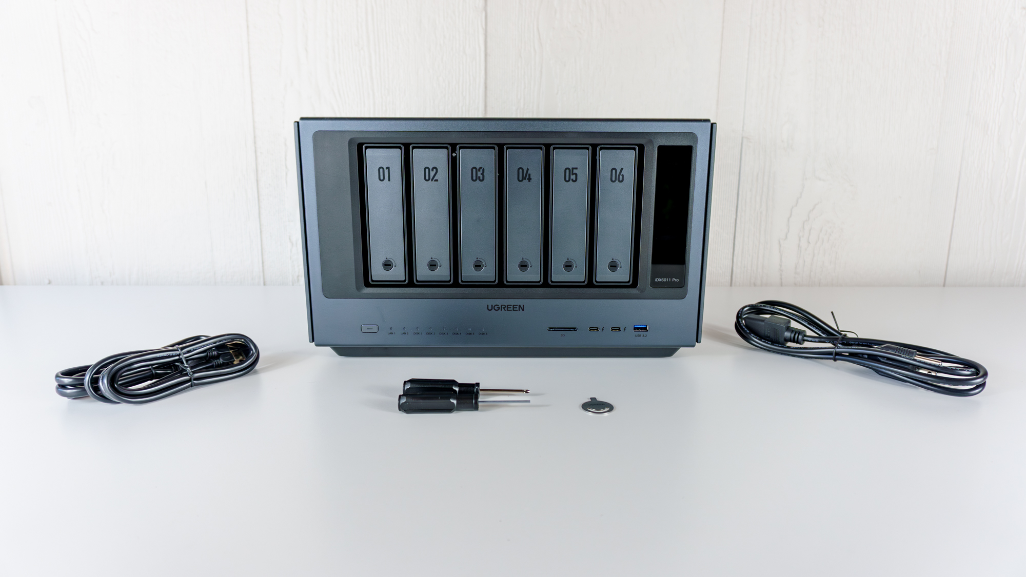 The Ugreen iDX6011 Pro NAS unboxed on a table