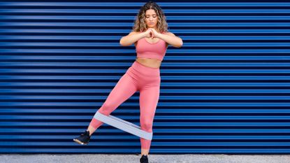 Woman working out with a resistance band