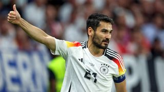 Germany captain Ilkay Gundogan raises his thumb during his side's Euro 2024 match against Switzerland.
