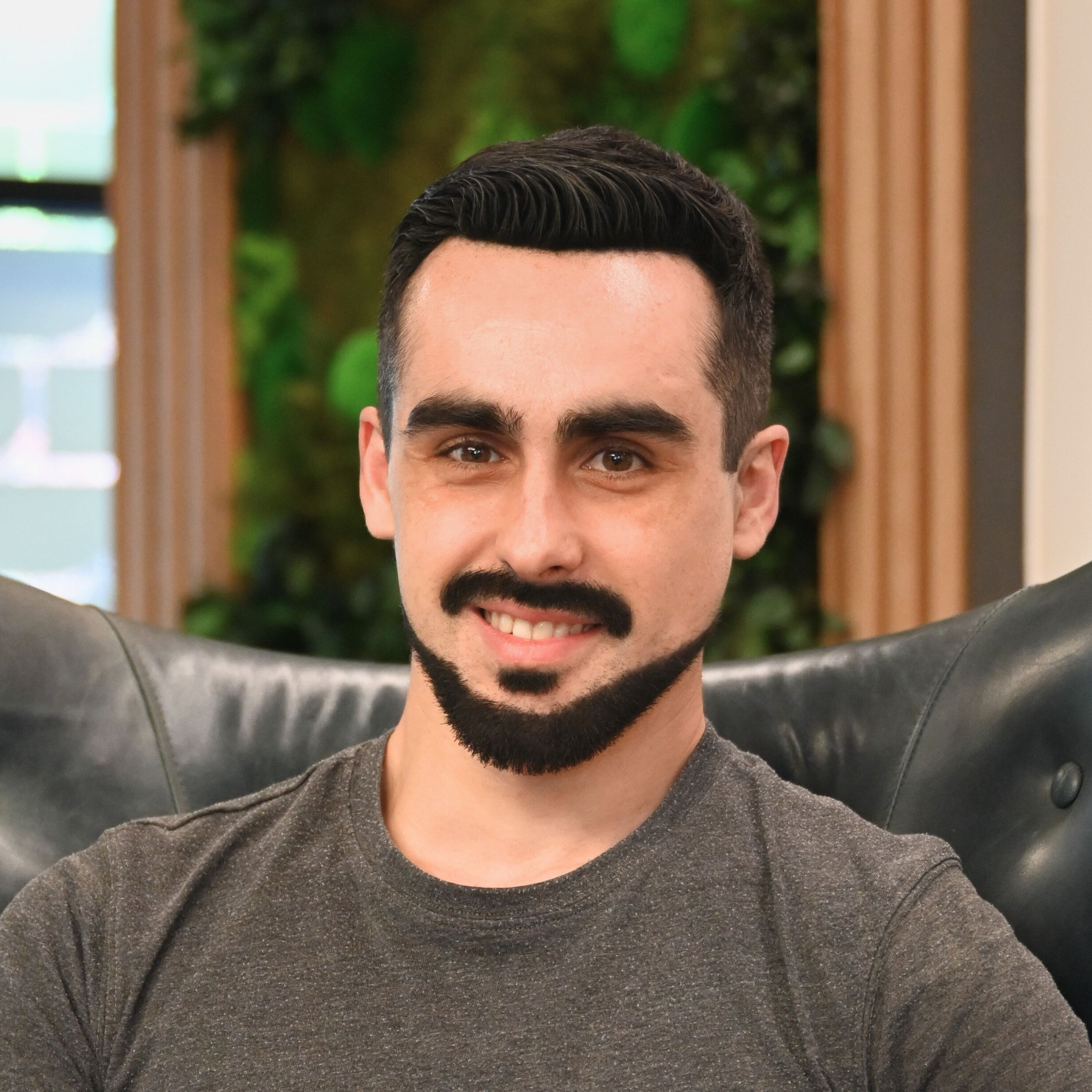 Headshot of Iskander Sanchez-Rola, Senior Director of AI and Innovation at Gen Digital.