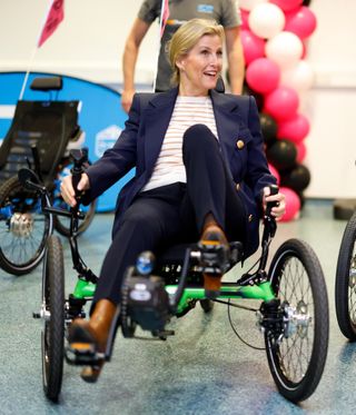 Sophie, Duchess of Edinburgh rides an adaptive recumbent tricycle as she attends the British Cycling National Track Championships at the National Cycling Centre on February 23, 2024