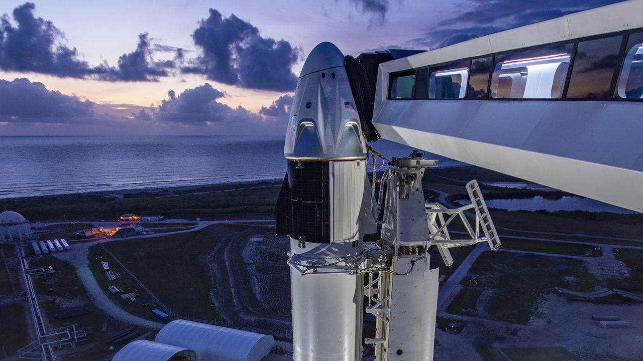 SpaceX's first Crew Dragon to carry astronauts and its Falcon 9 rocket stand atop Launch Pad 39A at NASA's Kennedy Space Center ahead of a planned May 27, 2020 launch.