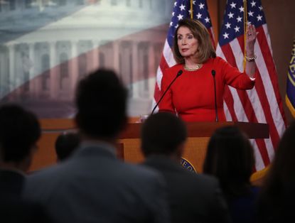 Nancy Pelosi at a news conference