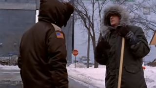 Two men talking on the street in cold weather in Fargo