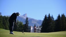 Angel Ayora strikes a fairway wood 