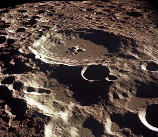 Scientists have proposed establishing a radio-frequency-interference-free site on the moon just inside crater Daedalus Crater. Daedalus may be the crater most shielded from Earth-made "radio smog" on the lunar far side.