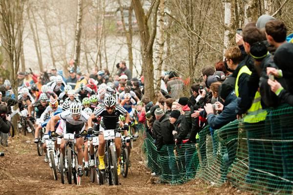 The elite men charge uphill on the first lap in Houffalize, Belgium