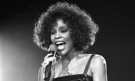 Whitney Houston performs at Wembley Stadium in London in 1988: The six-time Grammy winner died Saturday at the age of 48.