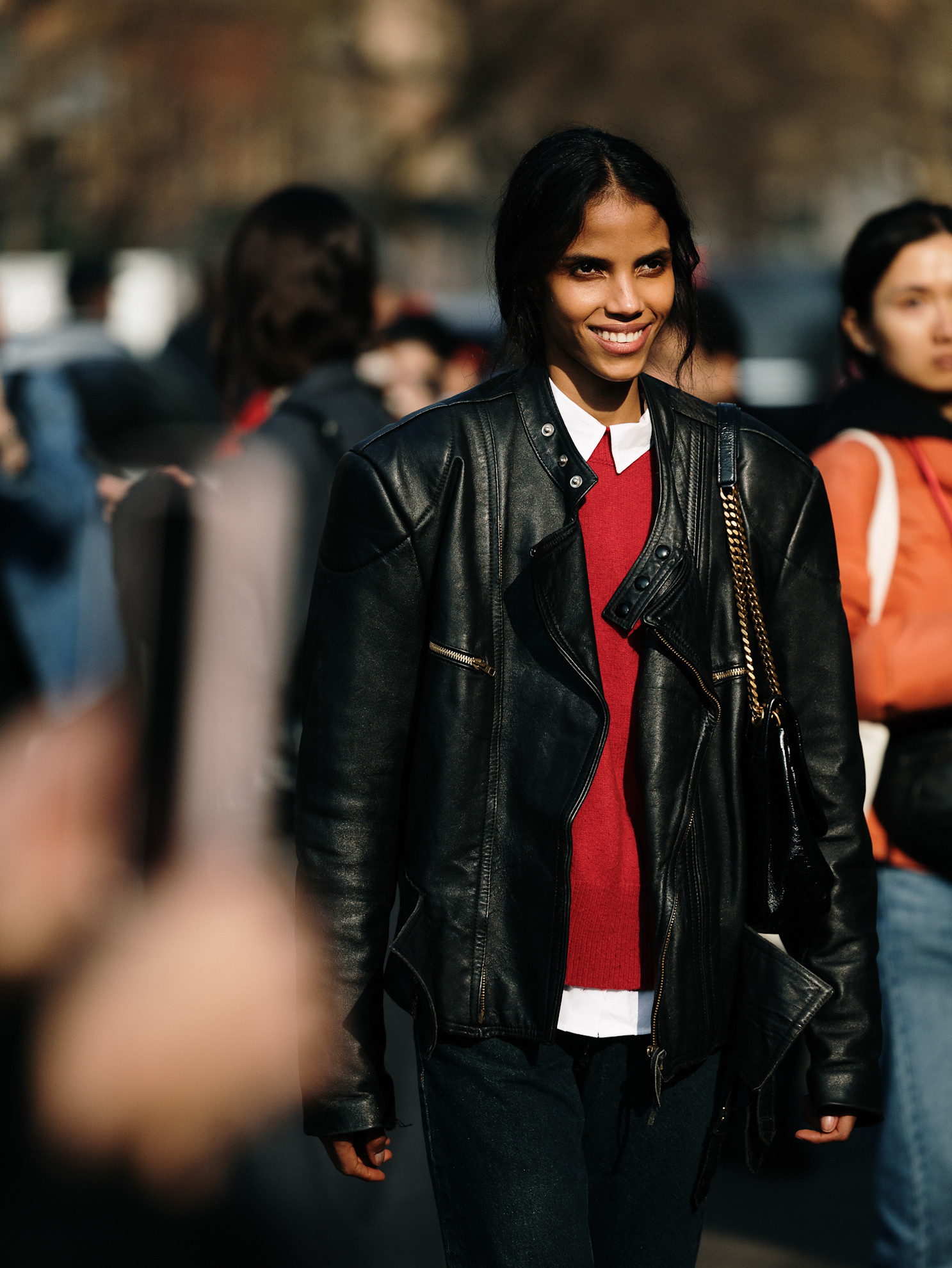 Model wears a leather bomber jacket at Milan Fashion Week