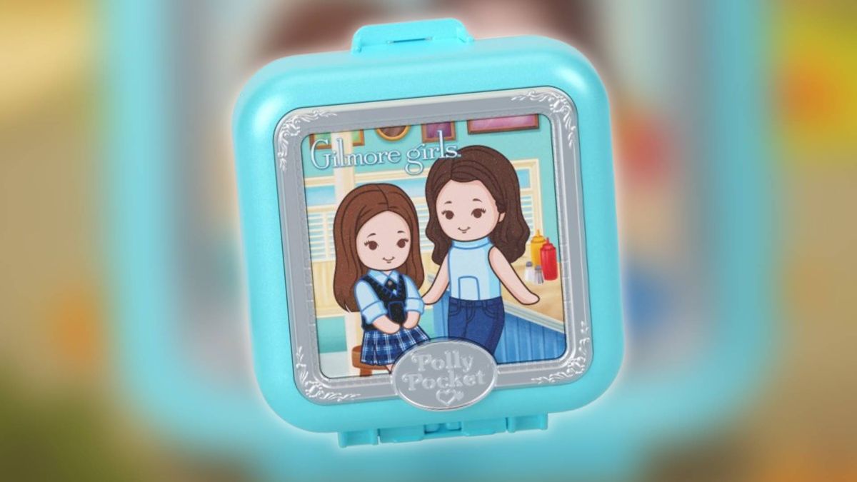 Image of the Gilmore Girls Polly Pocket compact on a blurred background.