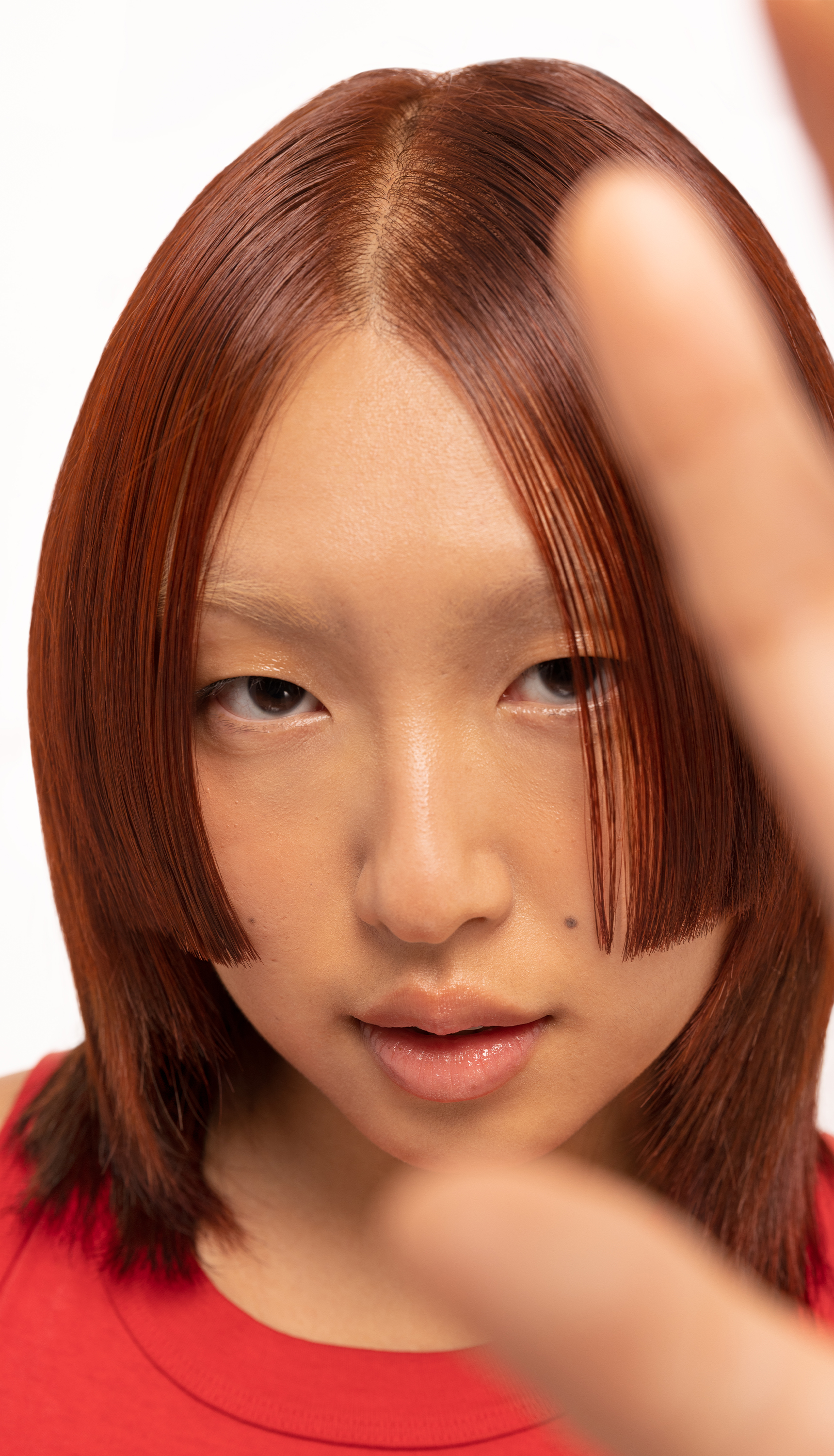 Model with copper hair, achieved with Bleach London No Bleach Hair Dye