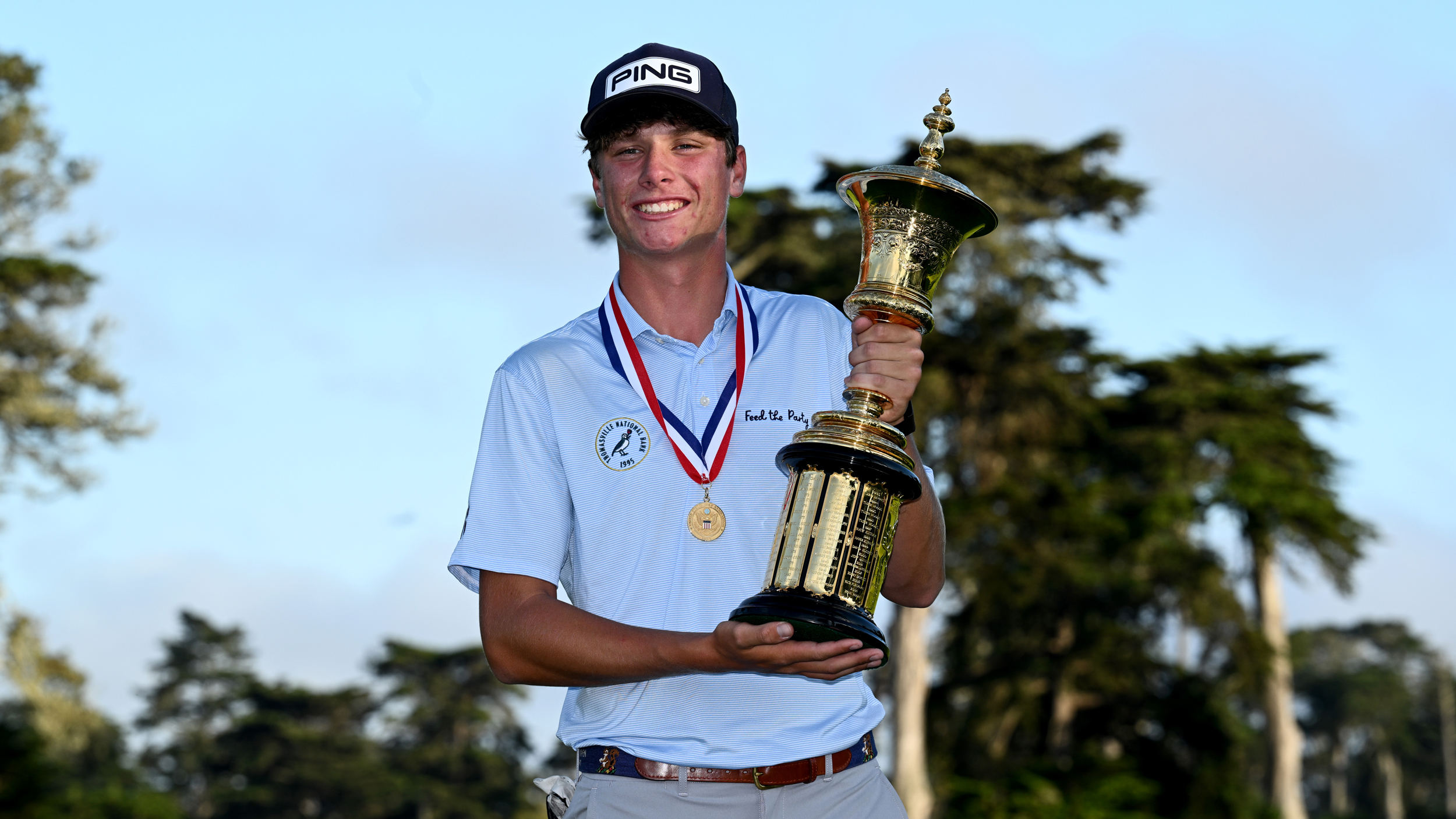 Mason Howell poses with the US Amateur trophy after winning in 2025