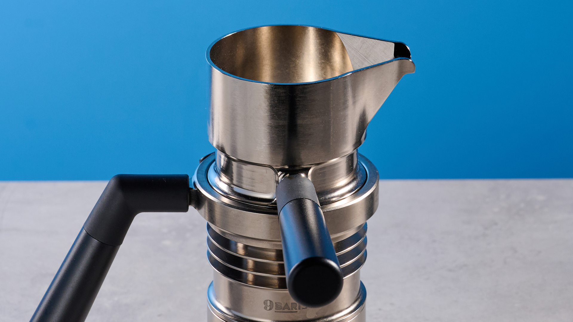 A photo of the 9Barista Espresso Machine Mk.2 against a blue background