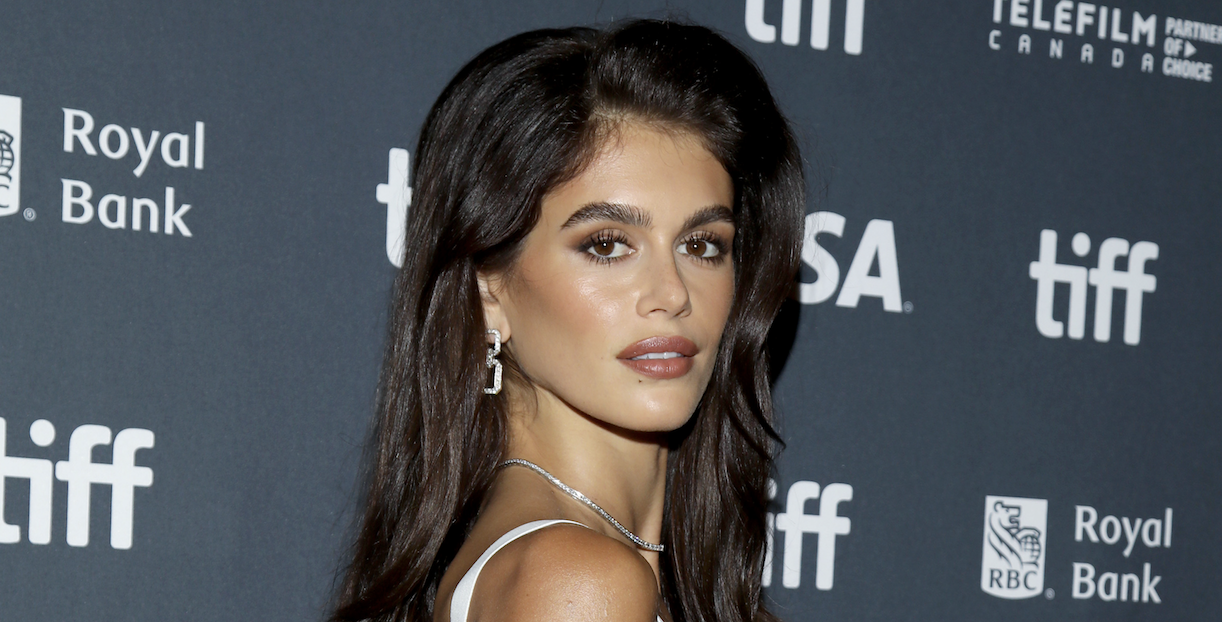 Kaia Gerber attends the premiere of "Shell" during the 2024 Toronto International Film Festival at Princess of Wales Theatre on September 12, 2024 in Toronto, Ontario wearing a white bandage dress from her mom cindy crawford