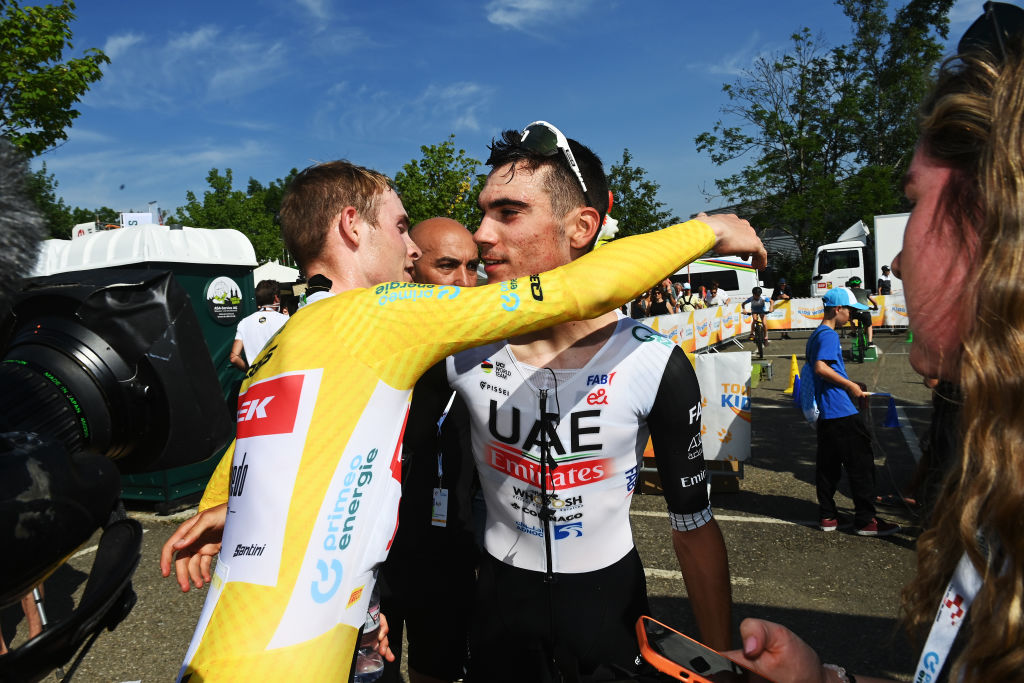 ABTWILL SWITZERLAND JUNE 18 LR Overall race winner Mattias Skjelmose Jensen of Denmark and Team TrekSegafredo Yellow Leader Jersey and stage winner Juan Ayuso of Spain and UAE Team Emirates react after the 86th Tour de Suisse 2023 Stage 8 a 257km individual time trial from St Gallen to Abtwil UCIWT on June 18 2023 in Abtwil Switzerland Photo by Tim de WaeleGetty Images