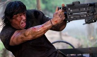Rambo (2008) John Rambo firing a mounted machine gun intensely
