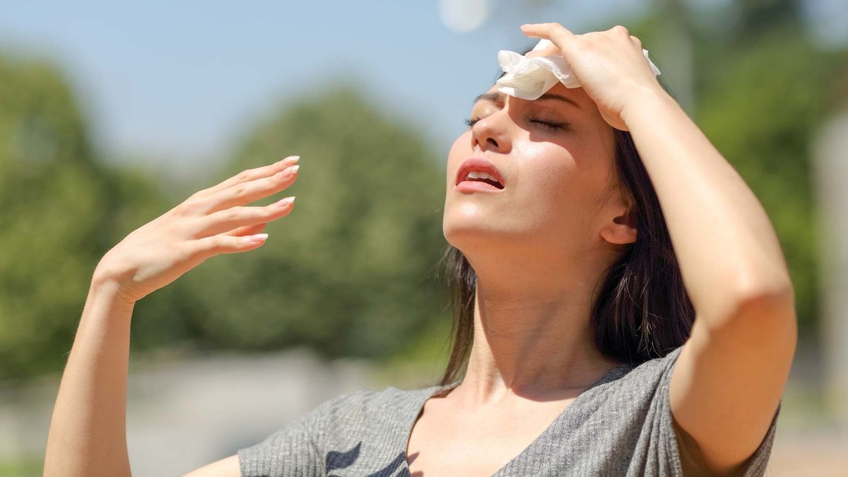 woman sweating in the sun