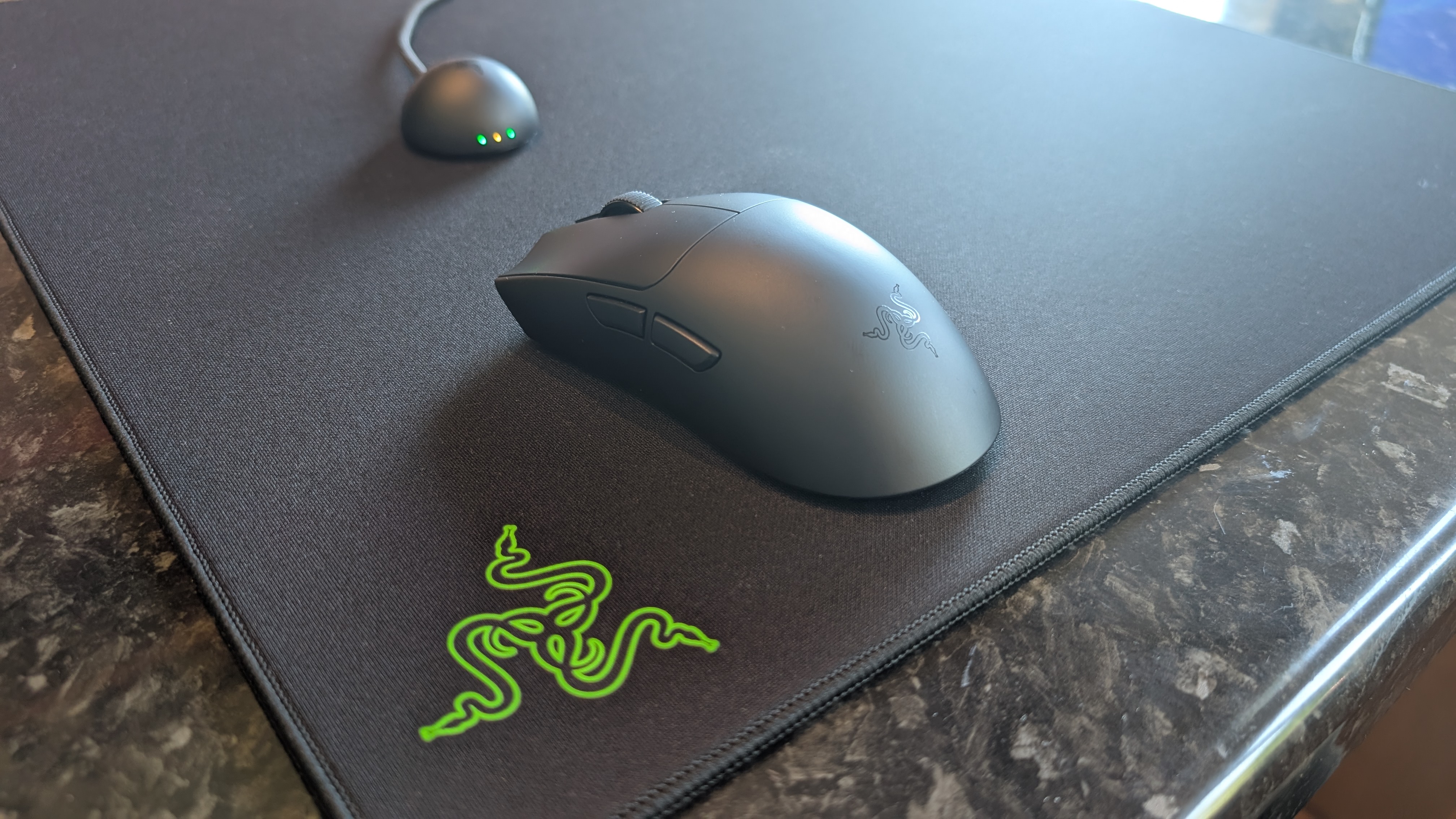 The Razer Viper V4 Pro gaming mouse pictured on the Razer Gigantus V2 Pro mouse mat.