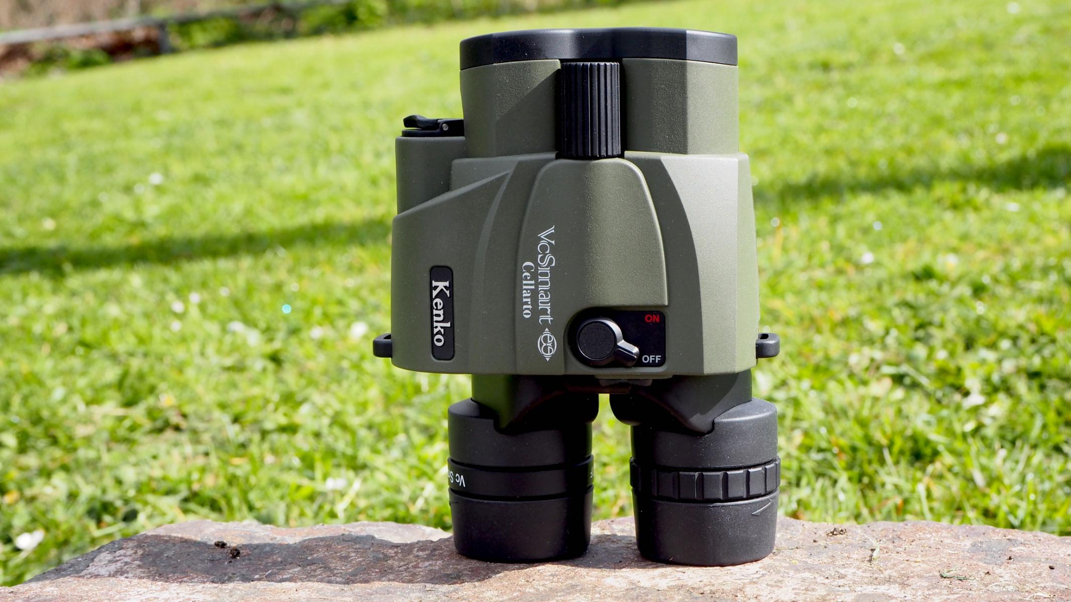 Kenko VC Smart Cellarto 10x30 WP binoculars, eyepieces down, standing on a wall.