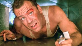 Bruce Willis (as John McClane) crawls in a vent in Die Hard, which is arguably a Christmas movie