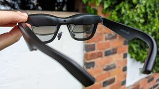 Xreal Air AR Glasses' inner lenses are facing the camera, the stems are in view too