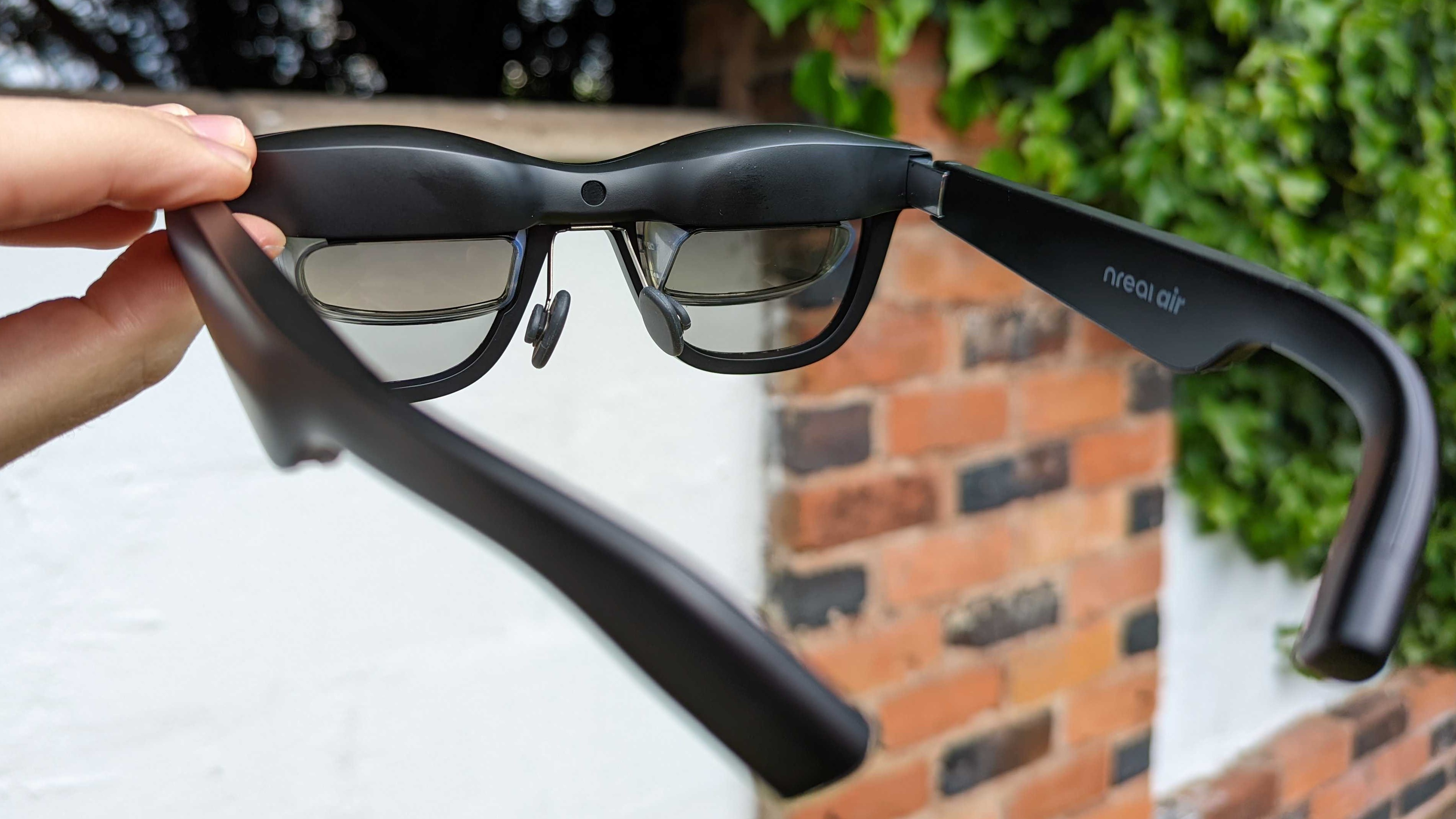 Xreal Air AR Glasses' inner lenses are facing the camera, the stems are in view too