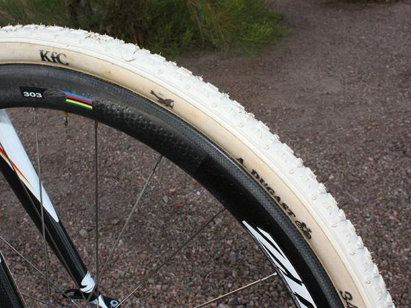 The light-and-fast Zipp 303 carbon tubular rims are wrapped in supple Dugast tubulars.