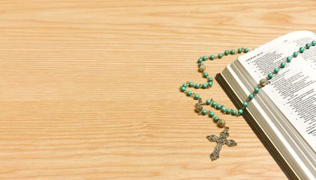 Rosary on Bible