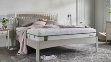 An image of an Emma mattress on top of a bed frame
