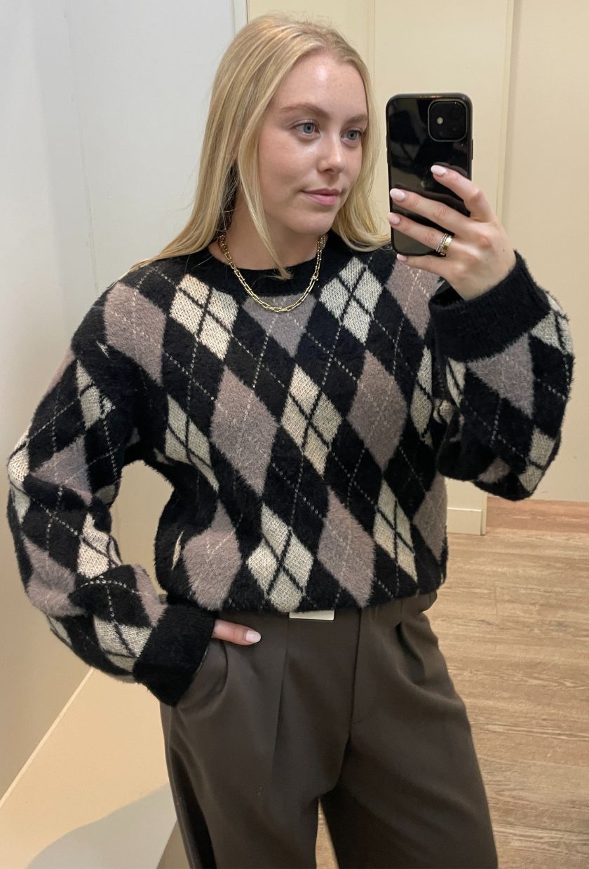 Shopping Editor, Florrie Alexander wears M&S' argyle crew-neck jumper (£38).