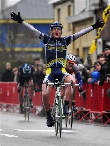 Bobbie Traksel (Vacansoleil Pro Cycling Team) raises his arms in celebration.