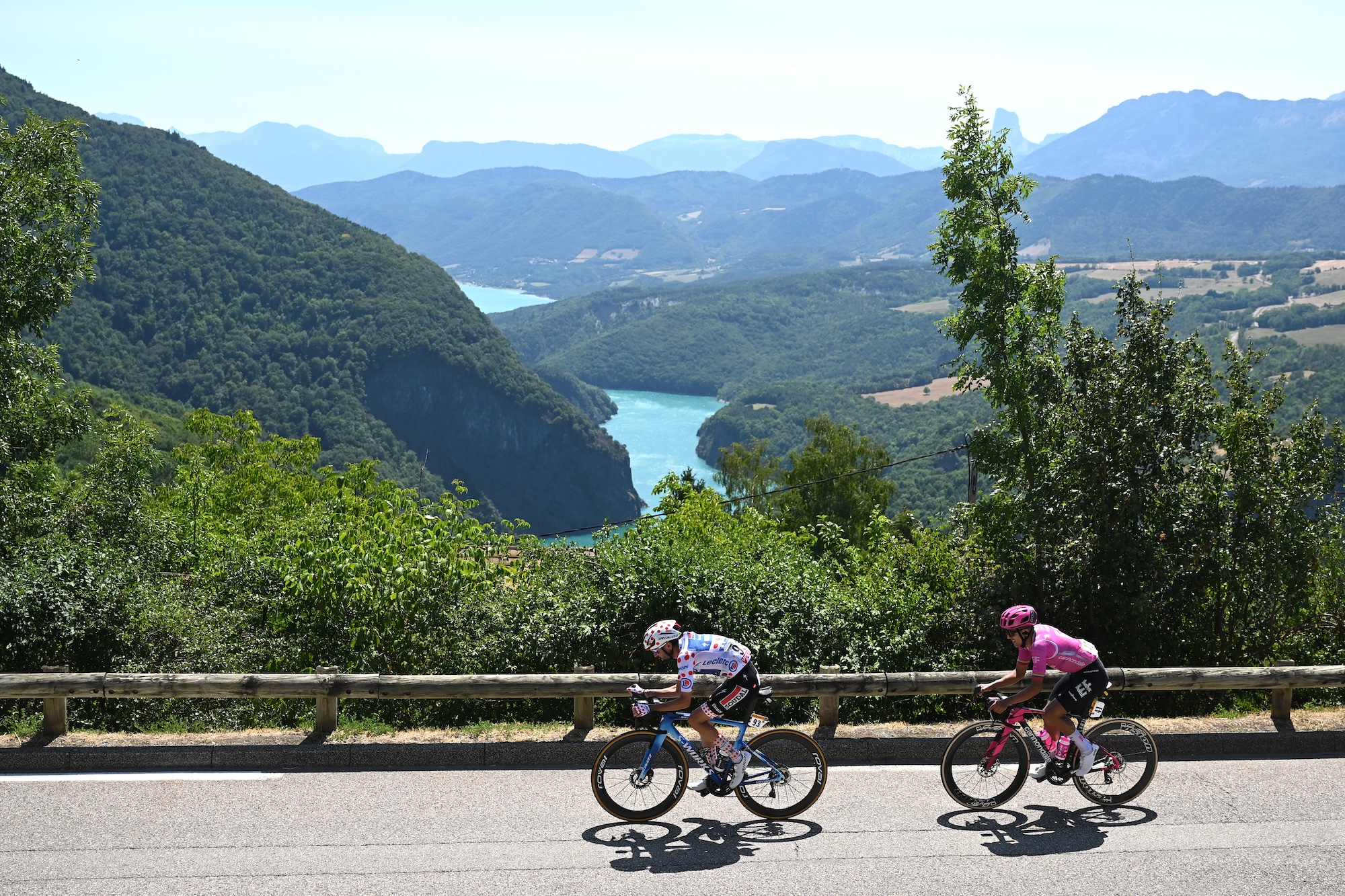 ORCIERES, FRANCE - JULY 23: (L-R) Valentin Paret-Peintre of France and Team Soudal Quick-Step - Polka Dot Mountain Jersey, Richard Carapaz of Ecuador and Team EF Education - EasyPost compete in the breakaway during the 113th Tour de France 2026, Stage 18 a 185.2km stage from Voiron to Orcieres-Merlette 1825m / #UCIWT / on July 23, 2026 in Orcieres, France. (Photo by Dario Belingheri/Getty Images)