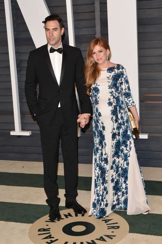 Isla Fisher & Sacha Baron Cohen At The Oscars After Parties, 2015