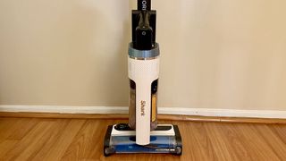 Shark Cordless Pro vacuum stored on its wand